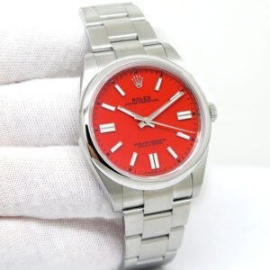 Rolex 124300 Oyster Perpetual 41 with Coral Red Dial